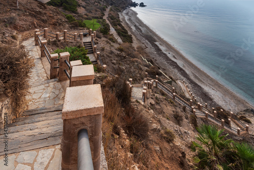 Stairs down to the nudist beach La Joya, in Torrenueva Costa, Granada, long and quite steep stairs until you reach the cove. Costa Tropical. photo