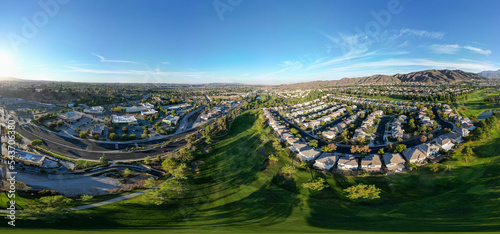 An Aerial UAV Drone View of The City of Yucaipa, California, in Southern California, looking at the Yucaipa Golf Course and the Residential Neighborhood Planned into the Site. photo