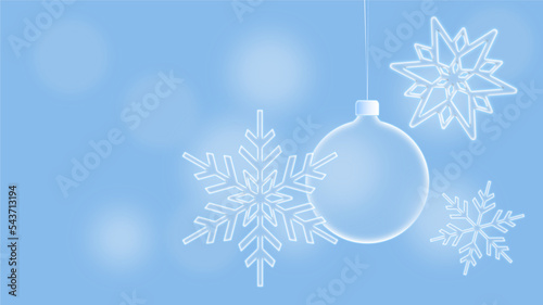 Christmas card showing snowflakes and a Christmas tree bauble on a blurred background.