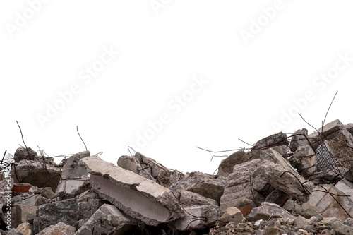 Foto Large concrete fragments of the remains of a building with protruding rebar isol