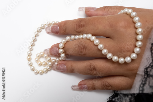 stylish female manicure , beautiful female hands on a white background