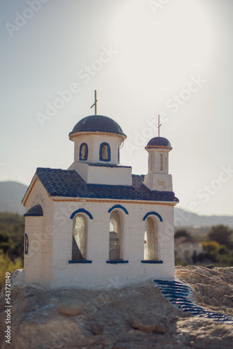 Miniature greek orthordox catholic church in sunlite on Kos photo
