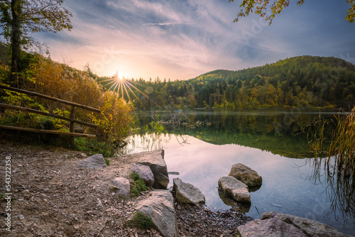 Sunrise over the Monticolo lake in Eppan in South Tyrol. © pawelgegotek1