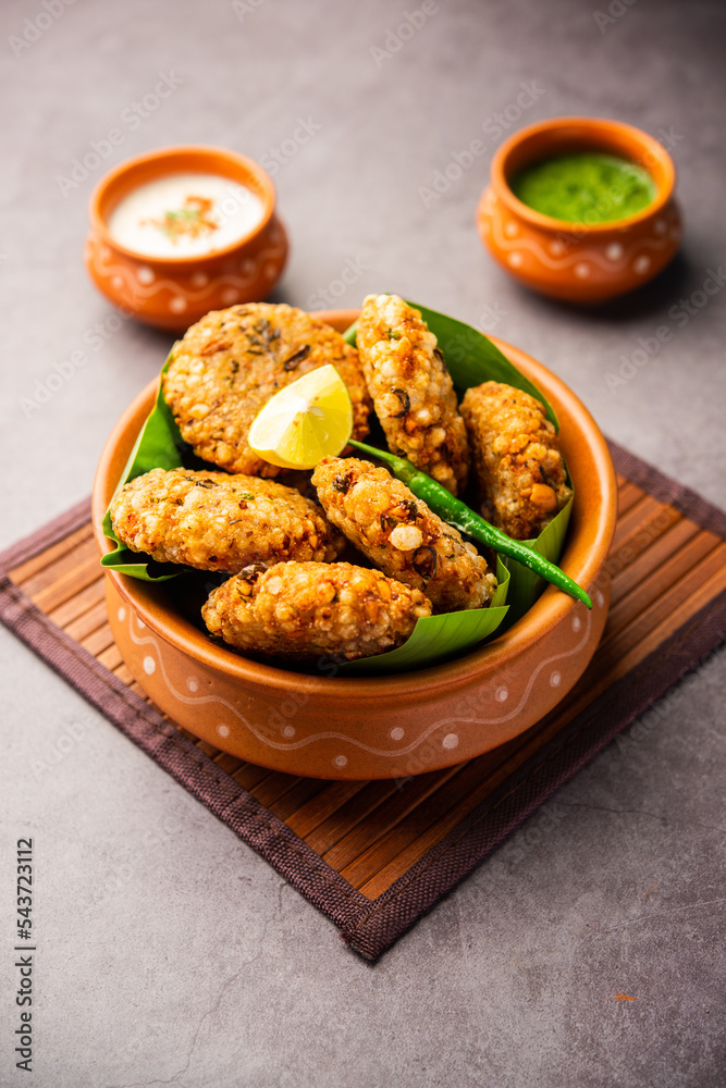 sabudana wada or shabudana vada called in india made from sago and served with chutney sabudana wada or shabudana vada called in india made from sago and served with chutney