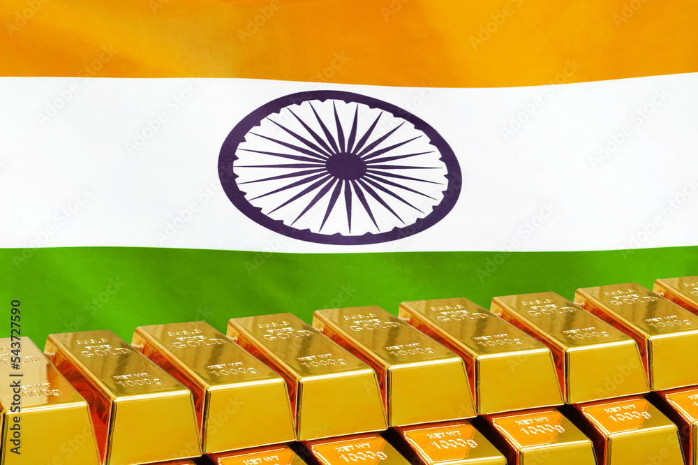 Row of shining golden bullions on the India flag background. Business and financial countrys