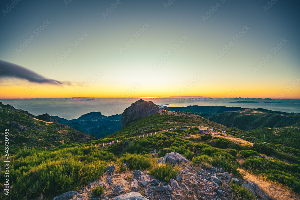 Madeira sunrise photographed from the beautiful mountain landscape of Pico do Ariero. Pico do Arieiro, Madeira Island, Portugal, Europe.