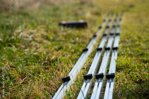 Obraz na płótnie aluminum profiles for the installation of photovoltaics w salonie