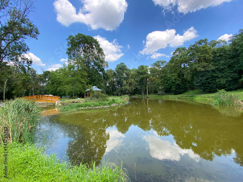 An small artificial lake or pond in the park of the Pejacevic family castle, Nasice - Croatia (Jezerce u parku dvorca Pejačević ili ribnjak u perivoju dvorca obitelji Pejačević, Našice - Slavonija) photo