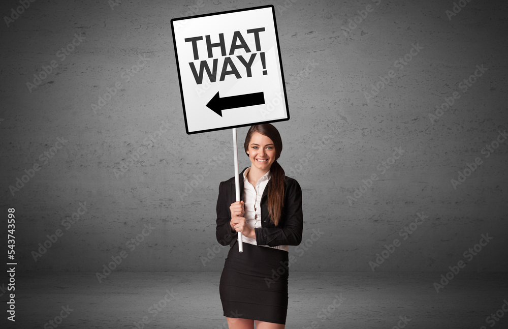 business person holding a traffic sign concept business person holding a traffic sign concept