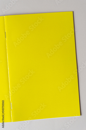 simple yellow booklet cover with staple binding