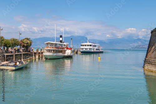 Ancient venetian walls and ferry port at Canale di Mezzo Peschiera, Lago di garda, Italy