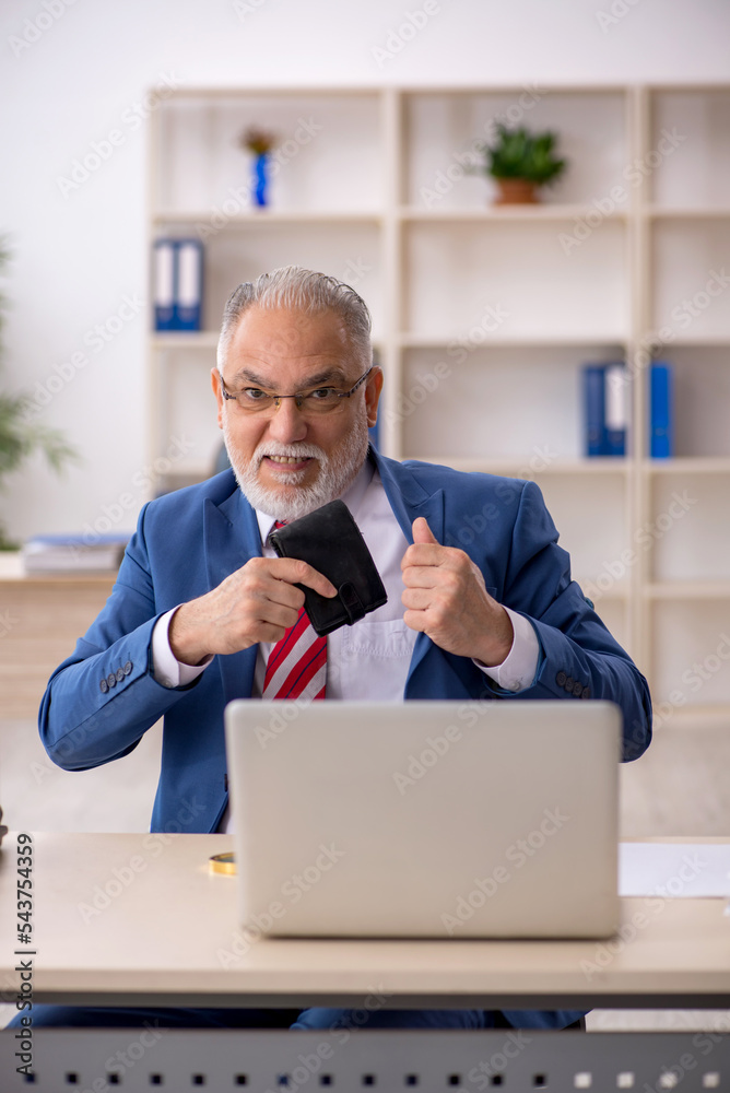 Old male employee in remuneration concept Old male employee in remuneration concept