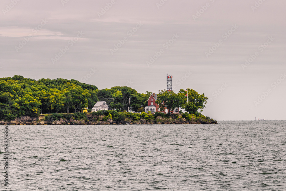 Fototapeta premium red house across the water