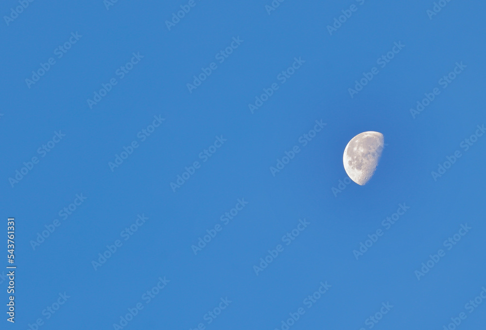 Beautiful blue sky nature with moon picture taken midday, Natural satellite, natural moon in midday. Beautiful blue sky nature with moon picture taken midday, Natural satellite, natural moon in midday.
