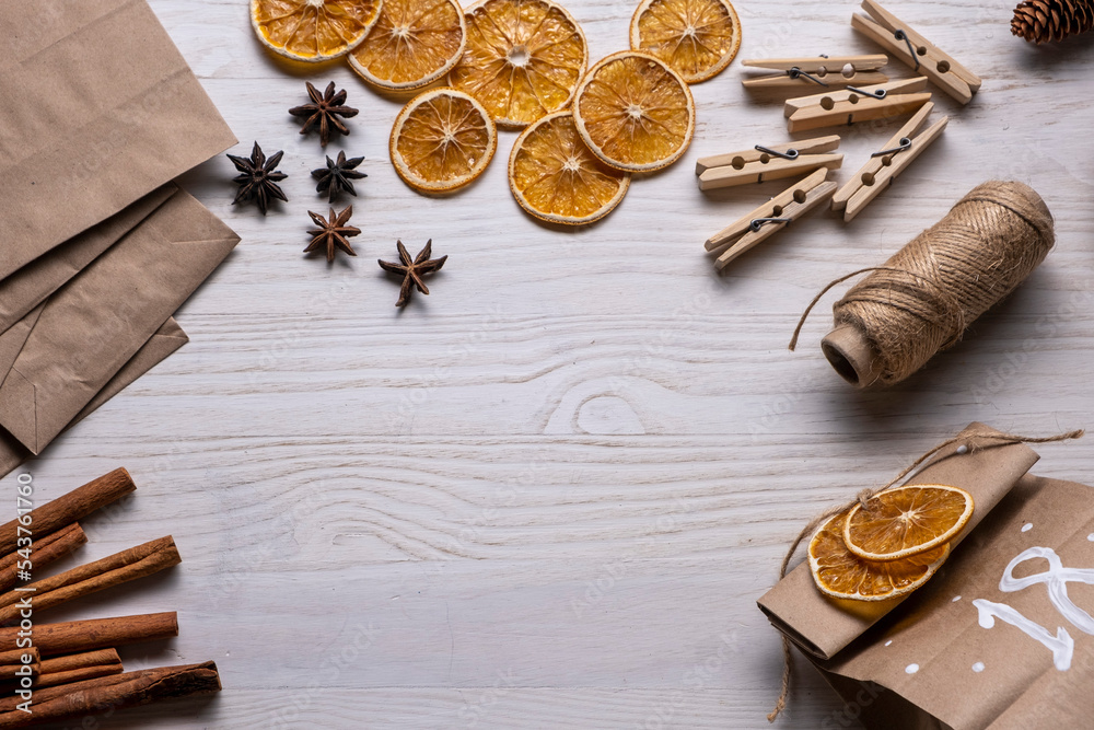 Handmade Advent calendar from craft paper with dry oranges and cinnamon Handmade Advent calendar from craft paper with dry oranges and cinnamon