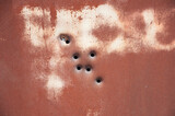 08-18-2011,California,USA.Bullet holes in an old rusty watertank
