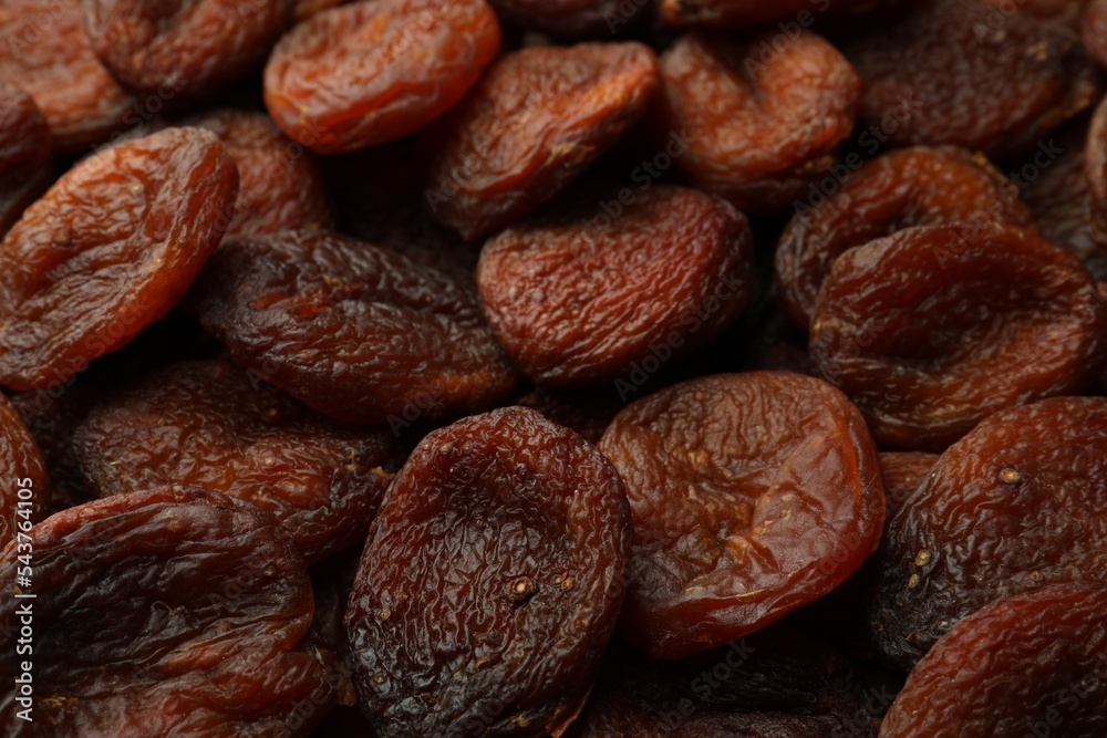 Tasty dried apricots as background, closeup. Healthy snack Tasty dried apricots as background, closeup. Healthy snack