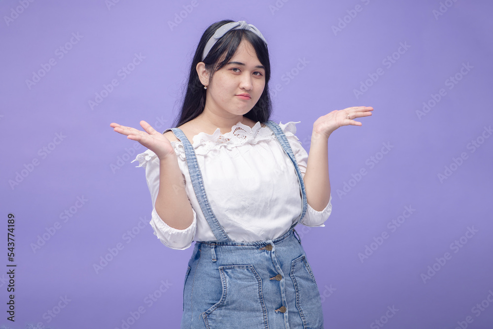 Chubby Asian Woman Isolated on Purple Background Chubby Asian Woman Isolated on Purple Background