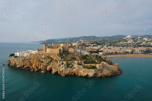 Aerial fly over above Peniscola Spain, one of the Los pueblos más Bonitos de España	