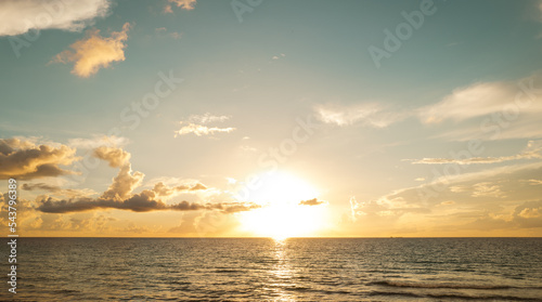 Cloudy sky on sea sunset  sunrise on ocean beach. Sunset landscape in the sky after sunset. Sunrise with clouds of different colors against the sky and sea.