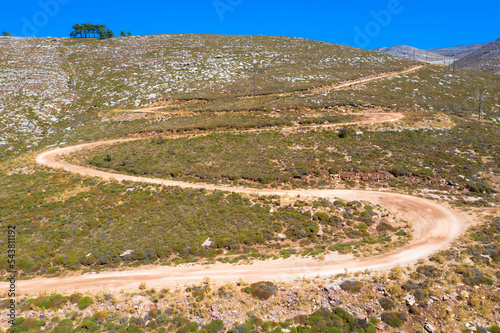 Drone photography from the winding country road to the top of Attavyros Mountain. Rhodes Island, Greece. 