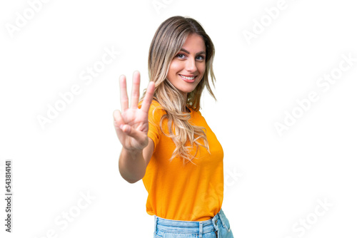 Young Uruguayan woman over isolated background happy and counting three with fingers