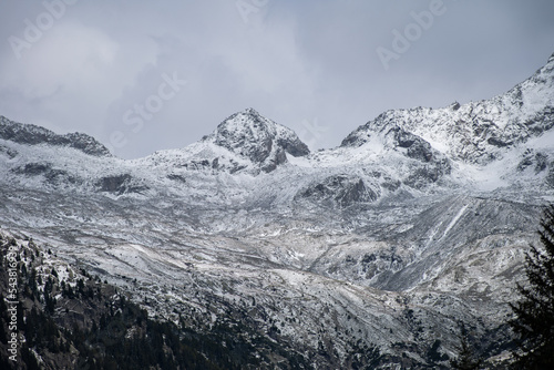 Snow covered mountain peaks during the afternoon of a cold winter, Northern Italy © Stefano Dosselli