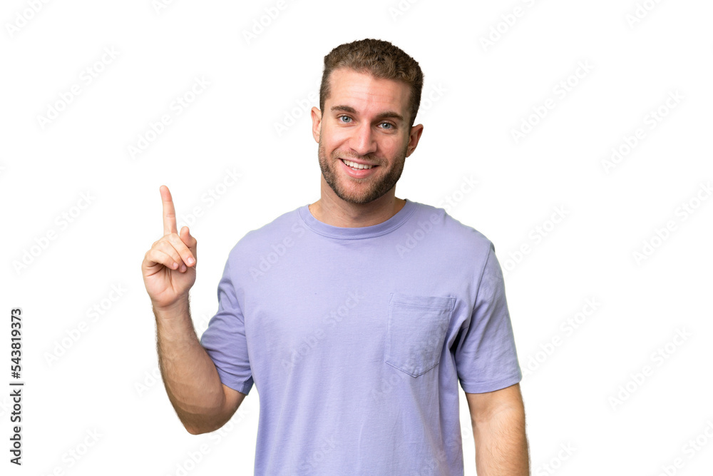 Young handsome caucasian man isolated on green chroma background showing and lifting a finger in sign of the best Young handsome caucasian man isolated on green chroma background showing and lifting a finger in sign of the best