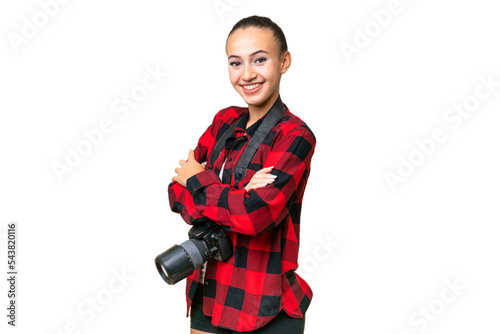Young photographer Arab woman over isolated background with arms crossed and looking forward
