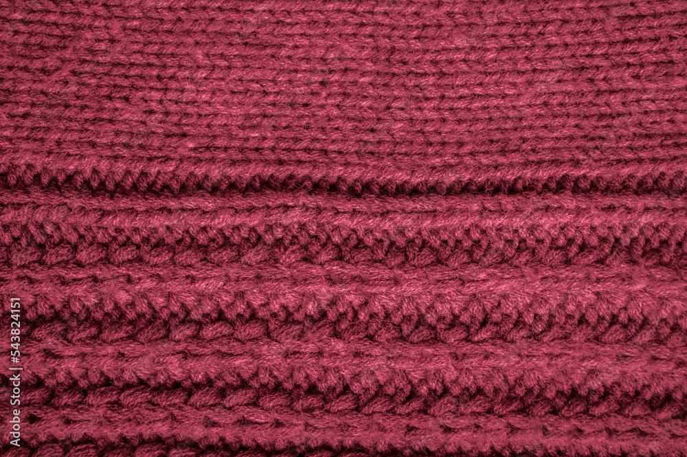 Handmade knit material with macro wool threads.