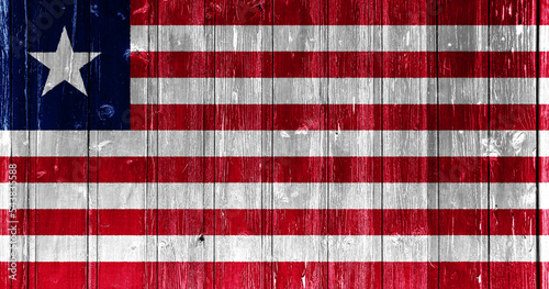 Flag of Liberia on a textured background. Concept collage.