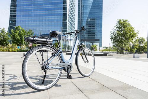 businessman rides e-bike