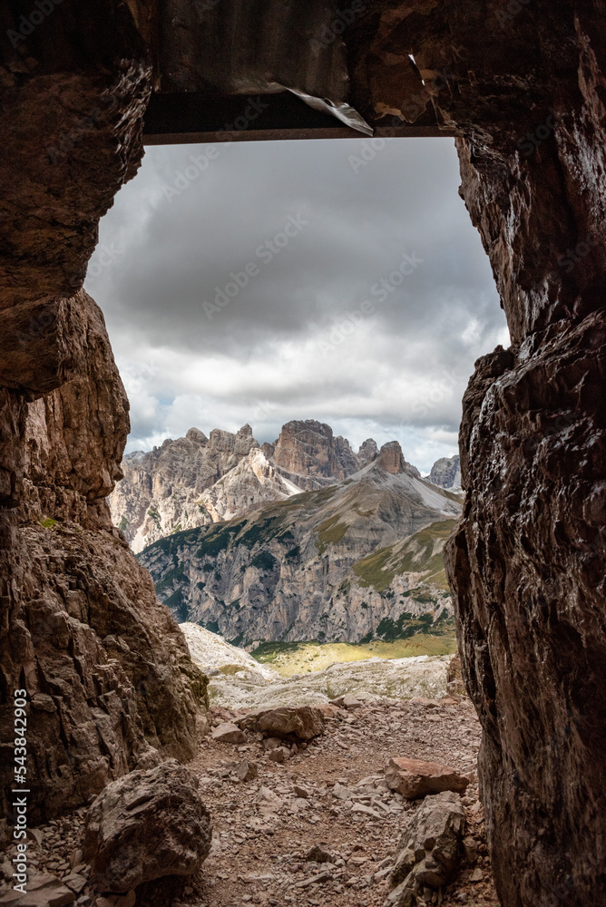 View through an old embrasure in an alpine fortress of the World War I, marking the former Austro-Italian frontier in the Dolomite mountains, South Tirol