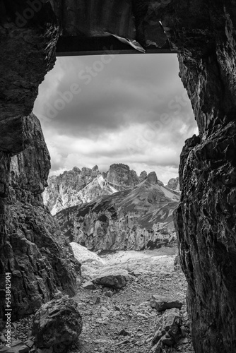 View through an old embrasure in an alpine fortress of the World War I, marking the former Austro-Italian frontier in the Dolomite mountains, South Tirol