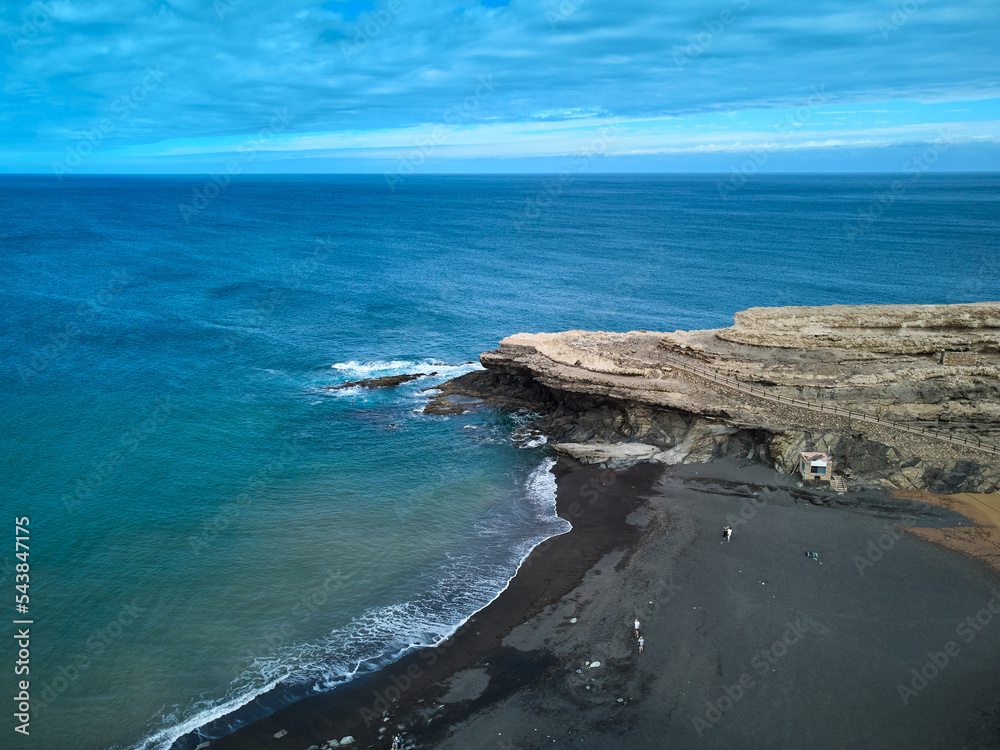 Aerial view of the Atlantic Ocean and the coastline in Ajuy Fuerteventura island drone photography