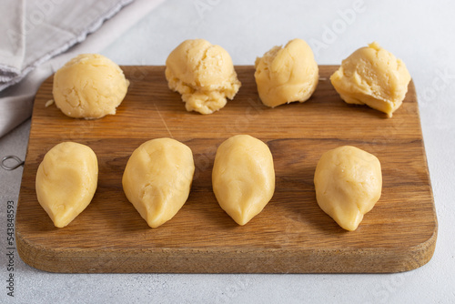 Step-by-step preparation of cookies winter hedgehogs with chocolate and coconut, step 3 - molding blanks for cookies from raw dough, horizontal