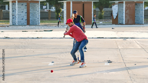 Photography local people playing cricket sport