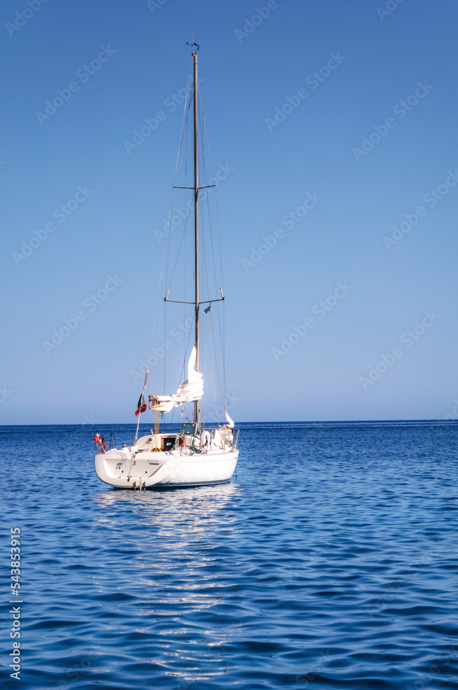 Amazing view to Yacht sailing in open sea at windy day. Yachting theme. Amazing view to Yacht sailing in open sea at windy day. Yachting theme.