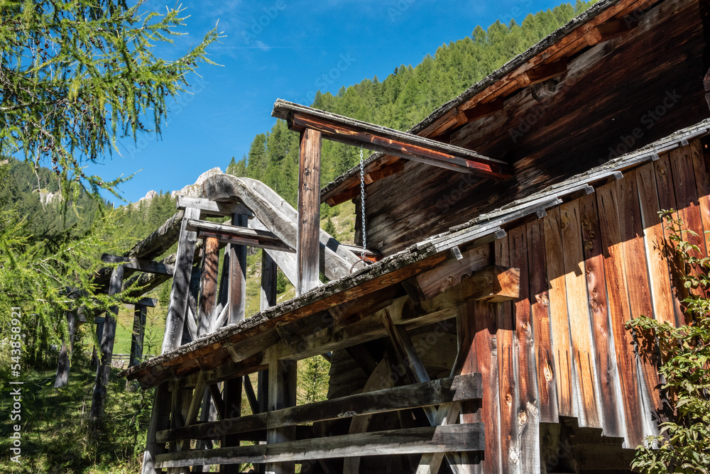 An old wooden watermill in Val di Morins in the Dolomite Alps of South Tirol
