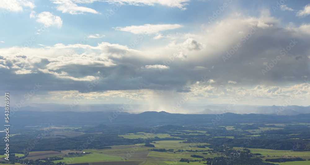 Fototapeta premium LIBEREC CZECH REPUBLIC MOUNTINE VIEW OF RAINY CLOUDS AND RAIN IN THE BACKGROUND