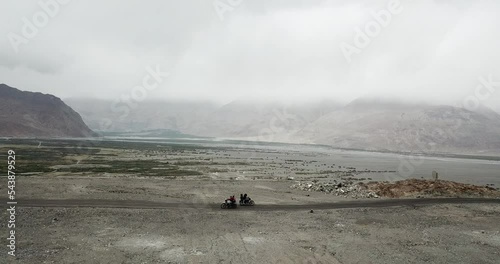 bike ride in leh with view of the mountains photo