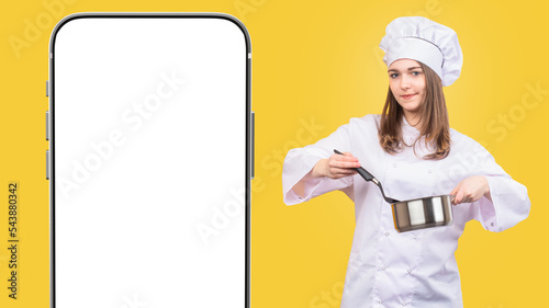 Woman chef smiling. Phone t...