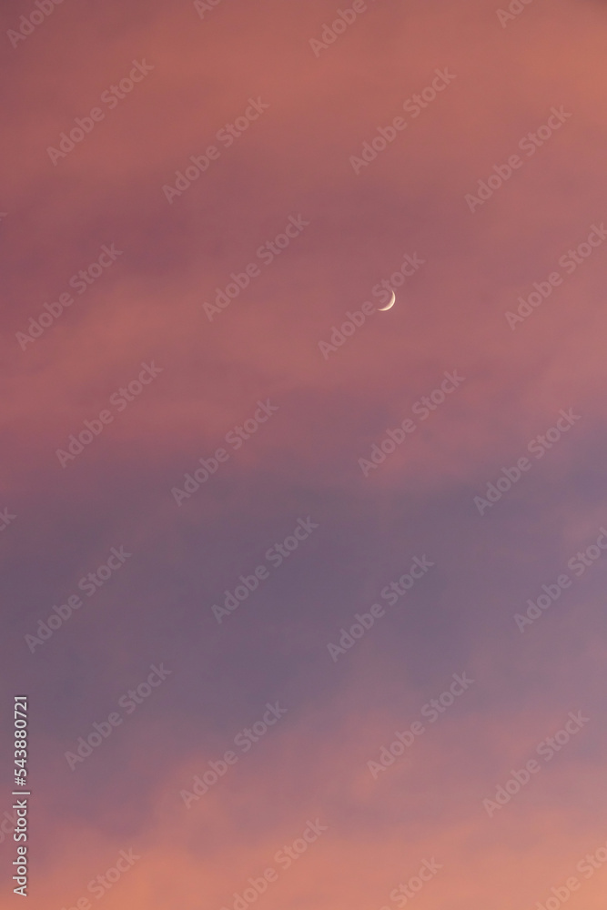 Crescent moon on beautiful sunset sky background. Crescent moon on beautiful sunset sky background.