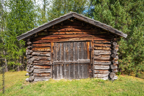Typical alp with a hay shed in the Dolomite Alps in the Fanes Sennes Prags Nature Park, South Tirol © imagoDens