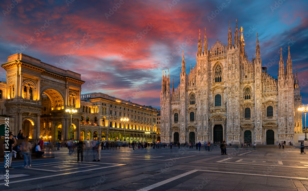Milan Cathedral (Duomo di Milano), piazza del Duomo and Vittorio Emanuele II Gallery in Milan, Italy. Sunset cityscape of Milan. Architecture and landmarks of Milan.