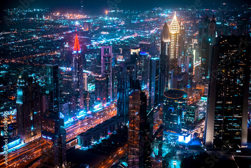 Dubai city at night  view with lit up skyscrapers and roads.  