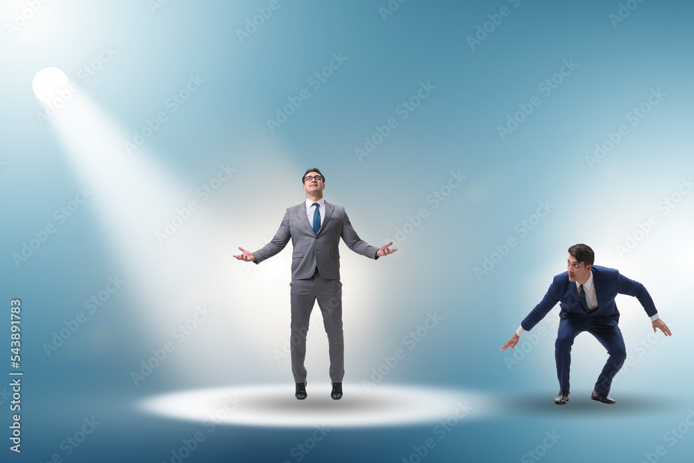 Business people under the spotlight Business people under the spotlight