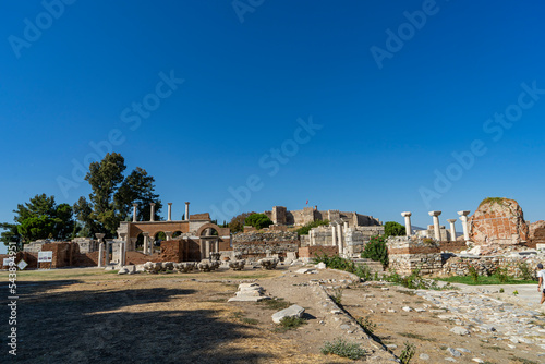 Ruins of the Basilica of St. Jean in Ephesus ancient city, Izmir, Turkey. View of the Saint John's basilica with Ayasuluk fortress on the background. Copy space for text.