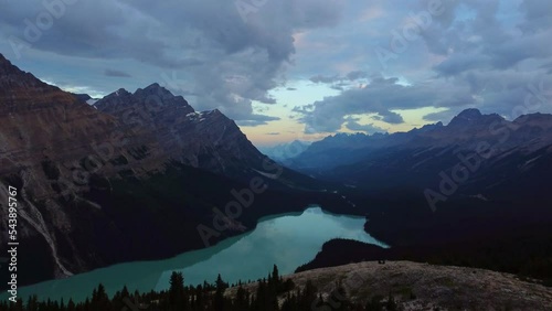 Aerial view rising from trees to Peyto Lake In the Canadian Rocky Mountains photo