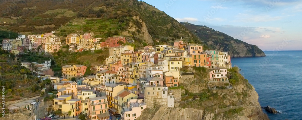 Manarola, Five Lands. Aerial view of coastline and city buildings